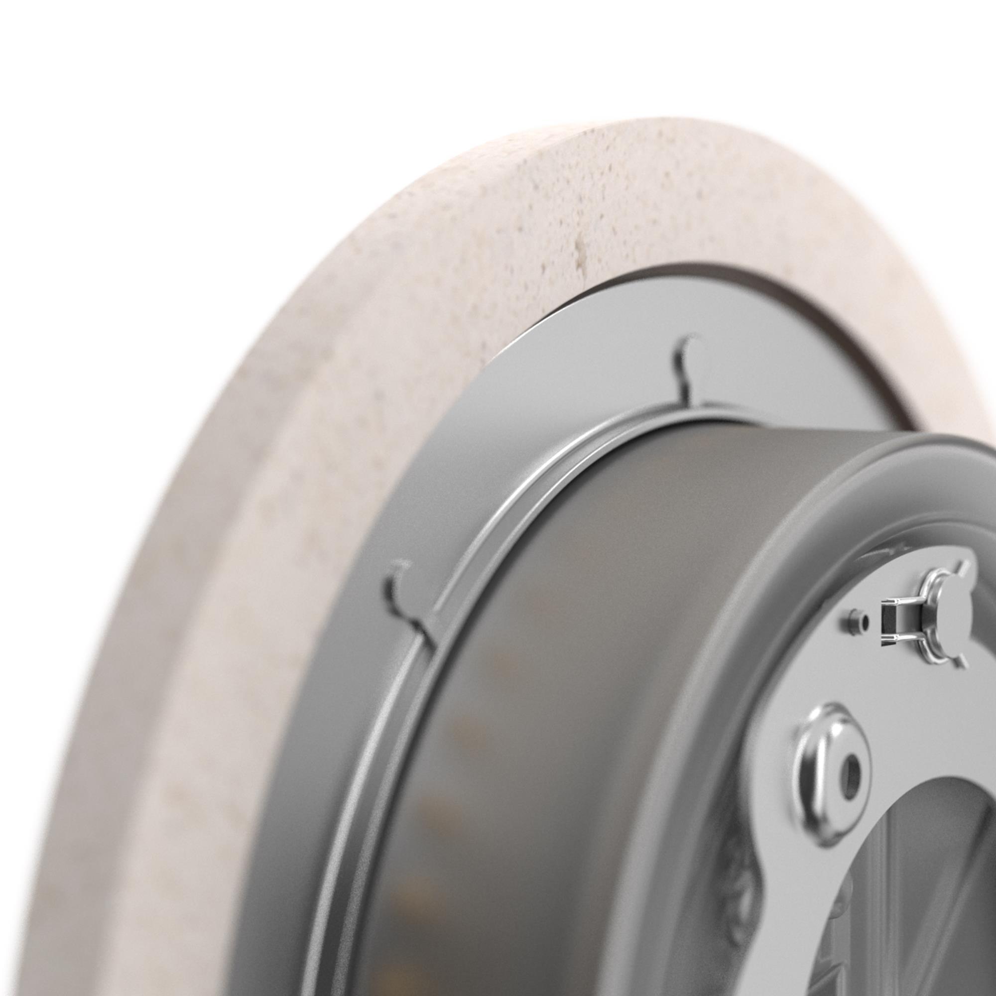 Detailaufnahme der Camouflage Beton Wandleuchte von Flos, runde Form, Beton und Metall.