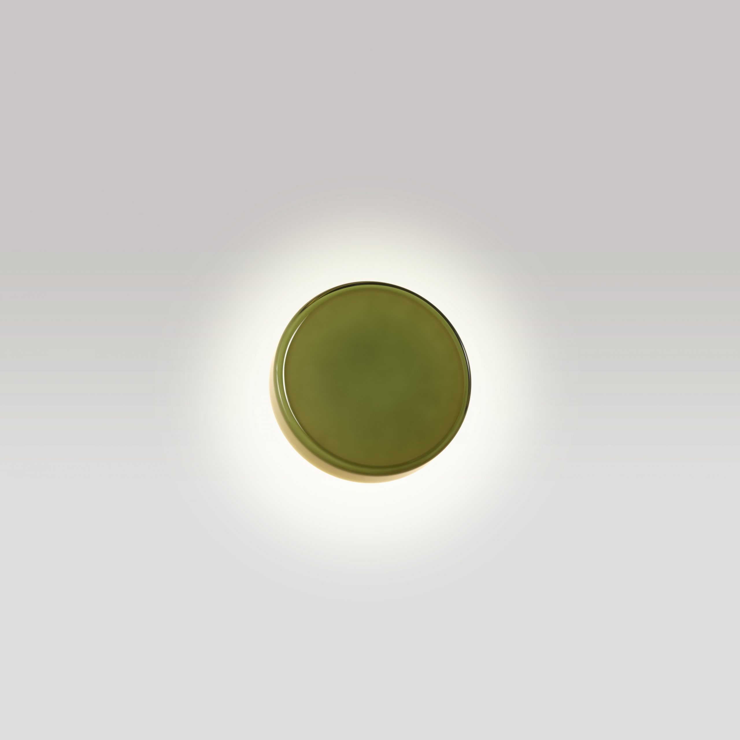 Grüne Caramel Wandleuchte von Marset, modernes Design für Wohnzimmer und Schlafzimmer.
