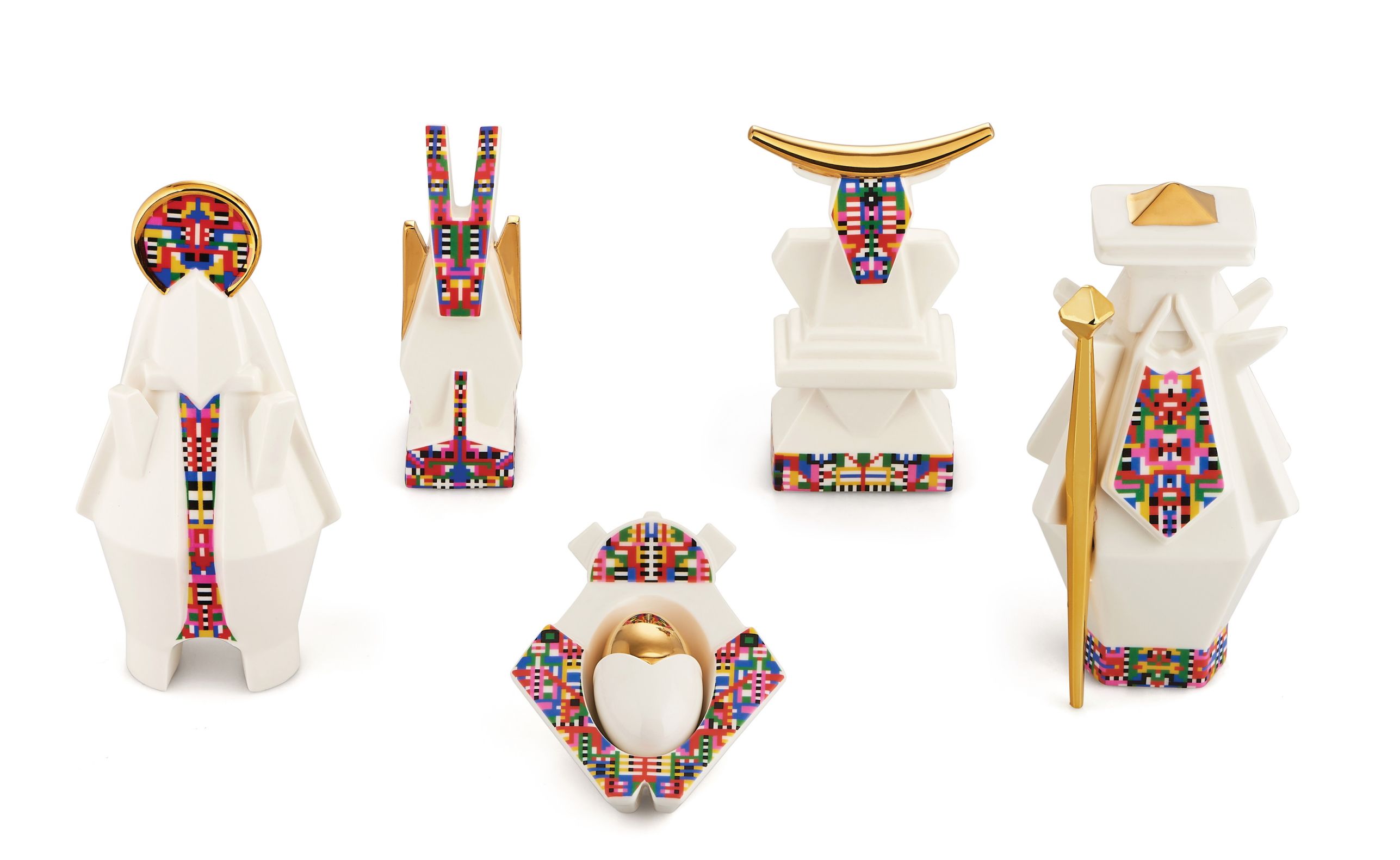 Joseph Porzellanfiguren ESA05 von Alessi, fünf weiße Deko-Objekte mit bunten Mustern und goldenen Akzenten.