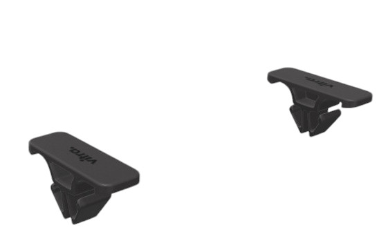 Zwei schwarze Vitra Anagram Plattformverbinder zur Verbindung von Möbeln, Detailaufnahme.