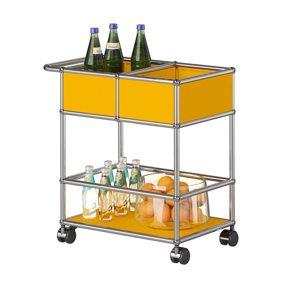 Gelber USM Haller Barwagen mit Getränken und Obst, modernes Designmöbel für Wohnzimmer und Büro.