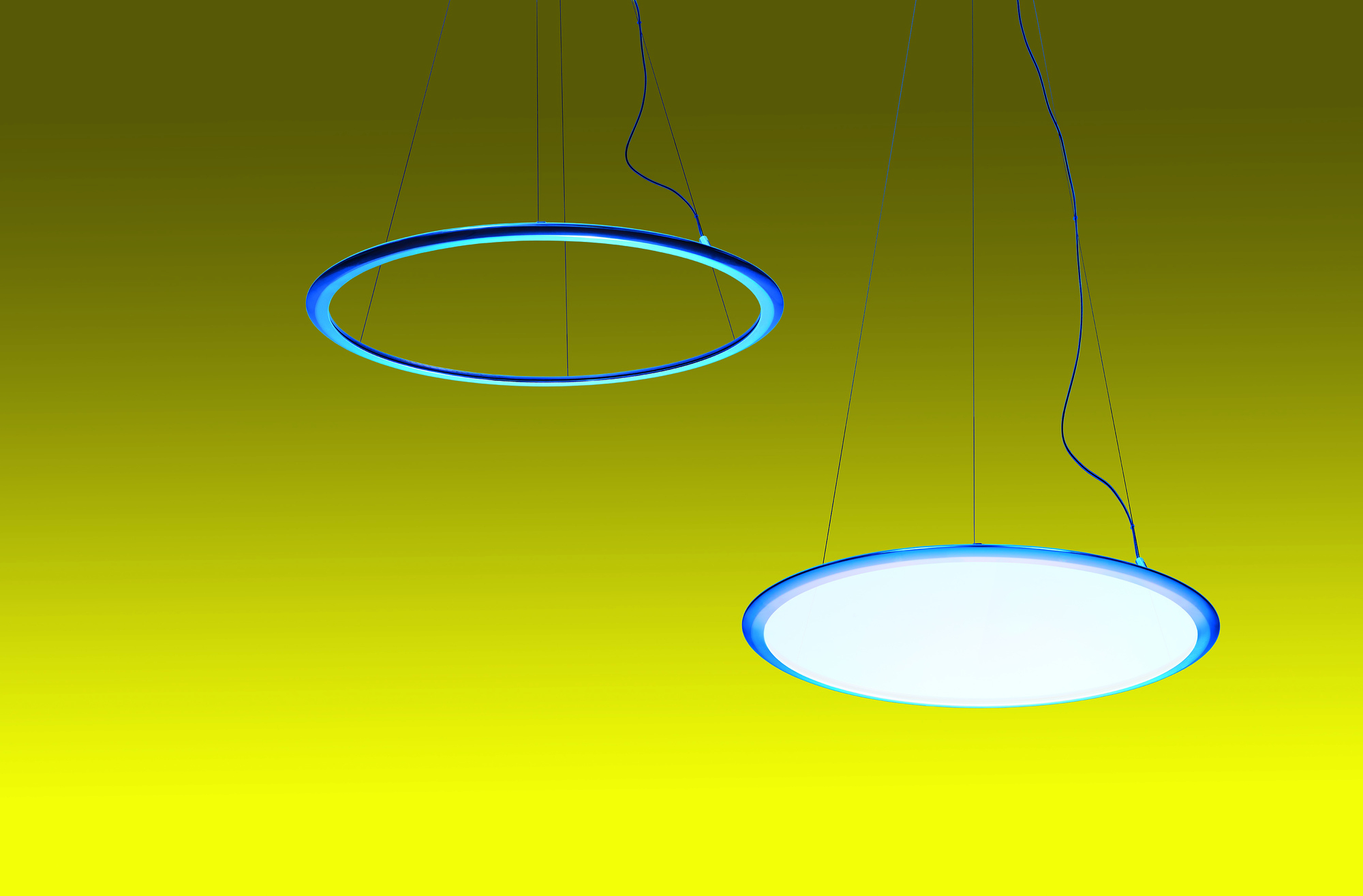 Zwei Discovery Pendelleuchten von Artemide: Eine als Ring, die andere als leuchtende Scheibe.