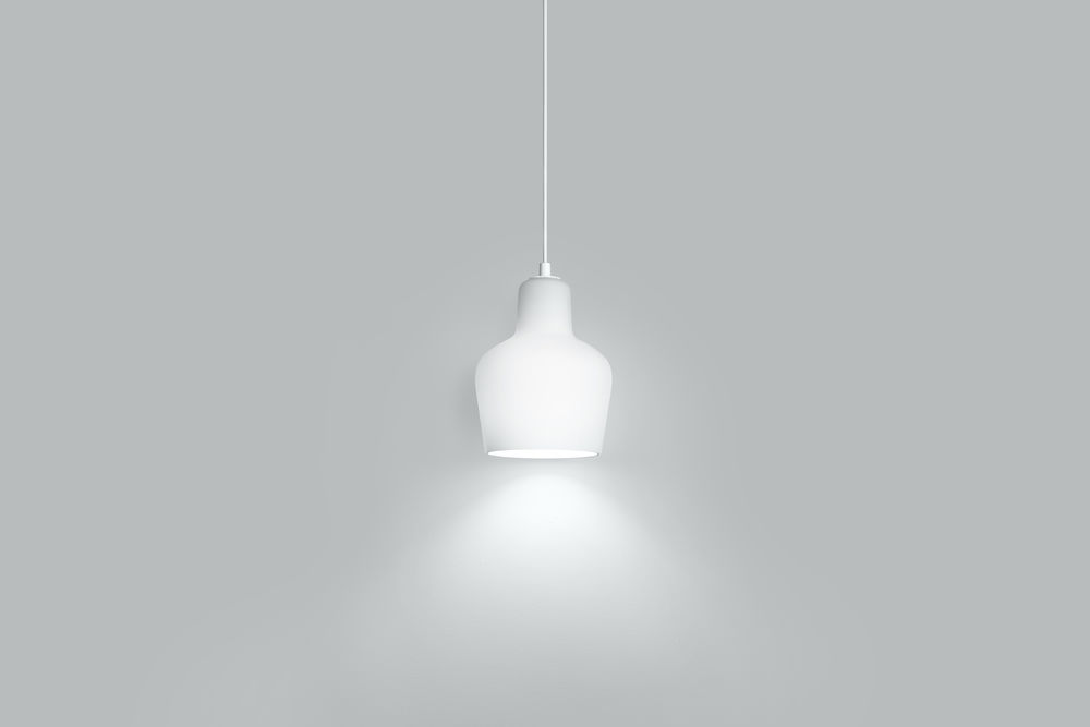 Weiße A440 Artek Hängeleuchte mit sanftem Lichtkegel vor grauem Hintergrund. Design Lampe für Wohnräume.