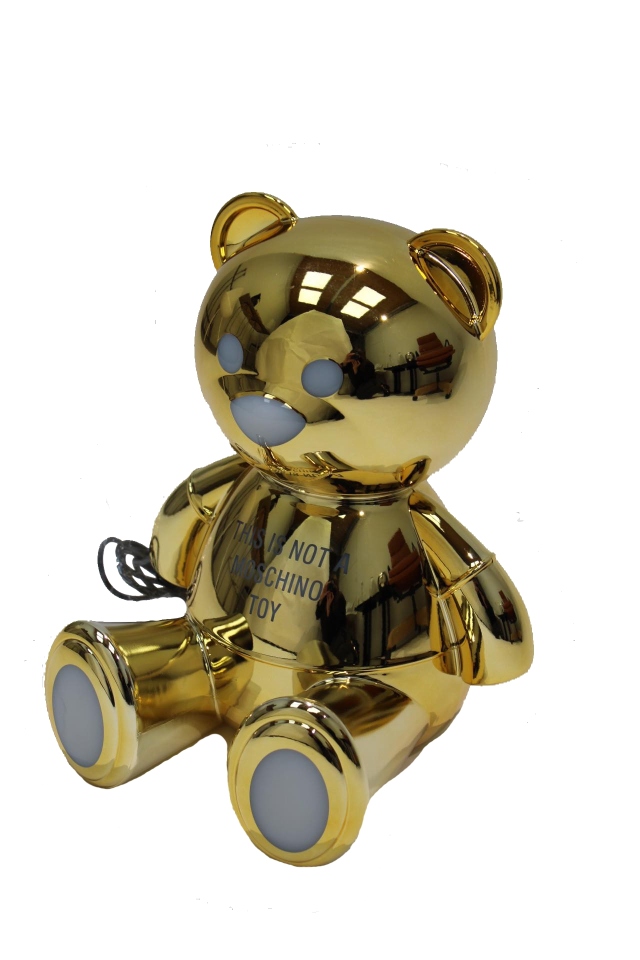 Goldene Moschino Bär Tischleuchte von Kartell, ein glänzendes und modernes Deko-Objekt für das Kinderzimmer.