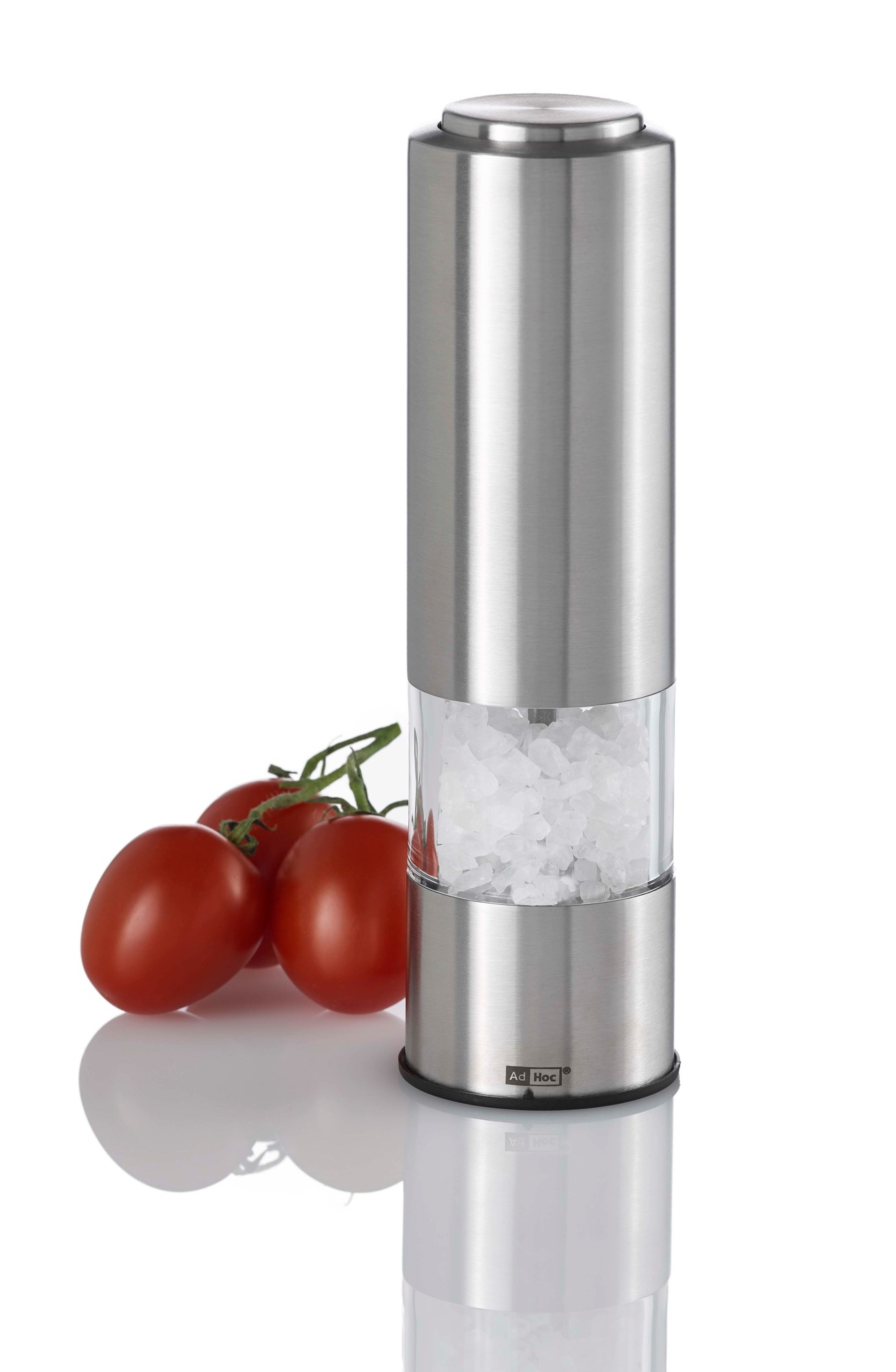 AdHoc Pepmatik elektrische Salzmühle aus Edelstahl mit grobem Salz und Tomaten.