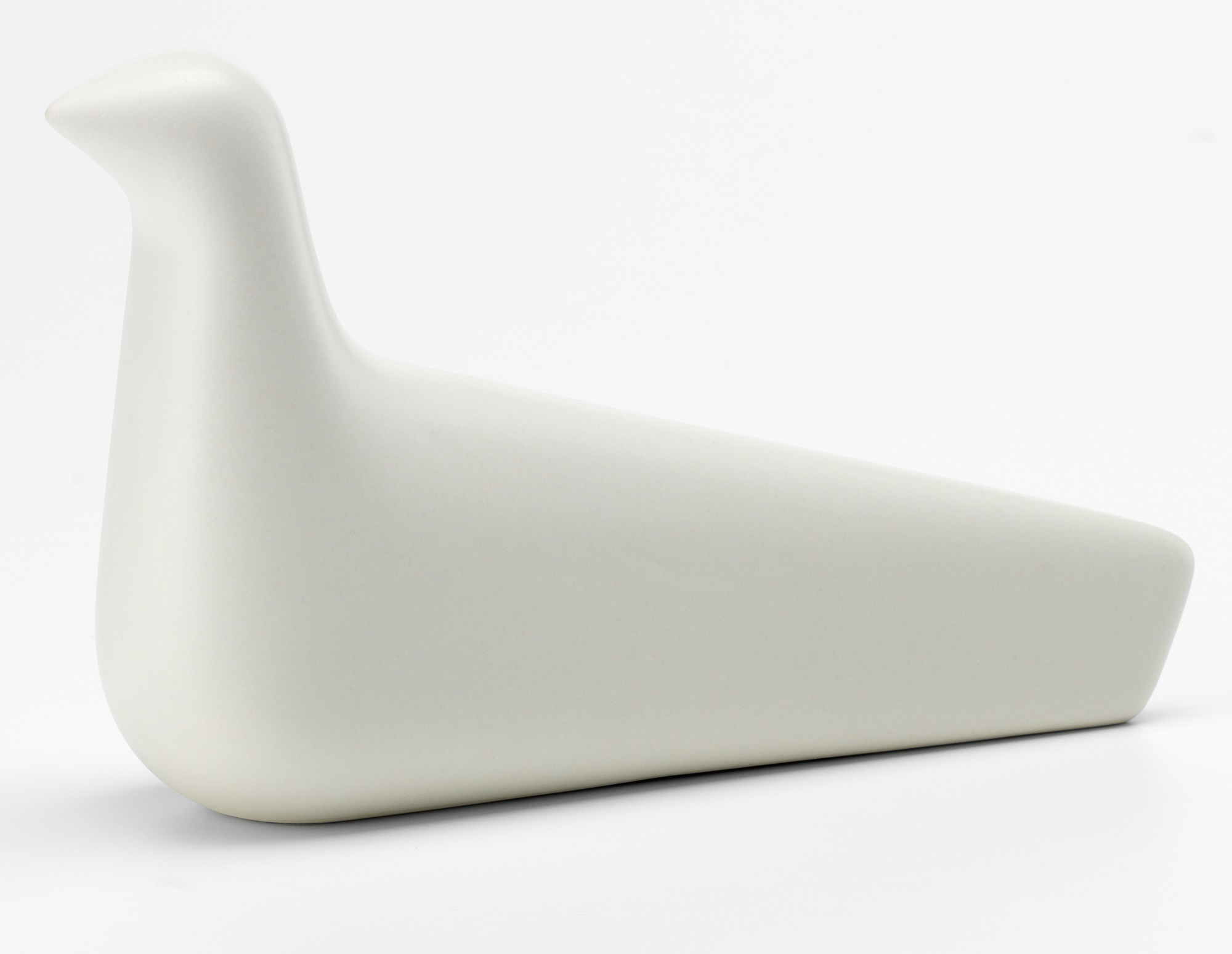 Elfenbeinfarbene L'Oiseau Friedenstaube von Vitra, eine moderne Holzfigur als Dekoration für Wohnräume.
