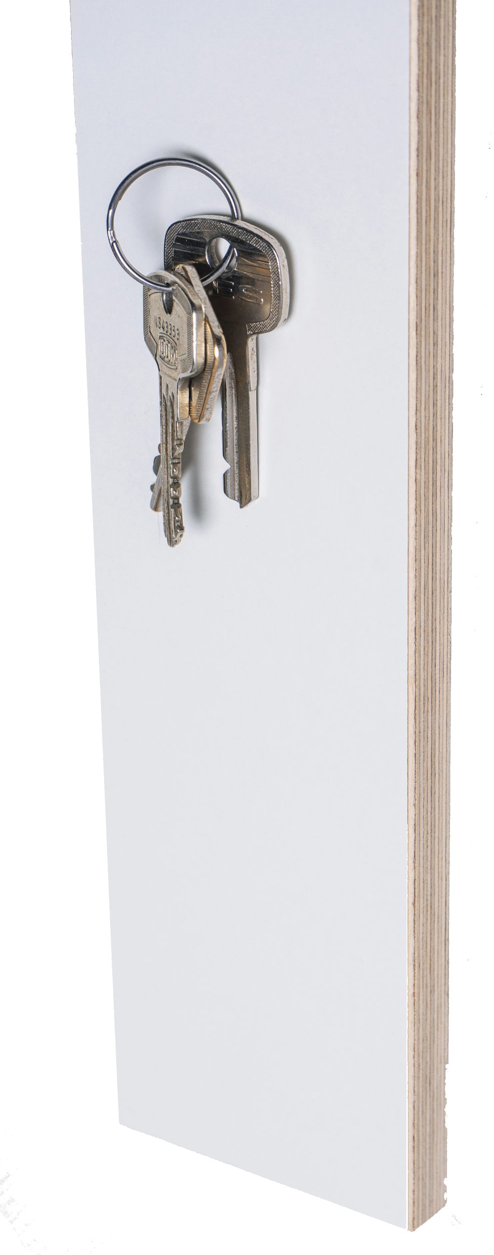 Weißes Schlüsselboard von Nils Holger Moormann mit Schlüsselbund aus Metall. Schlüsselaufbewahrung für den Eingangsbereich.