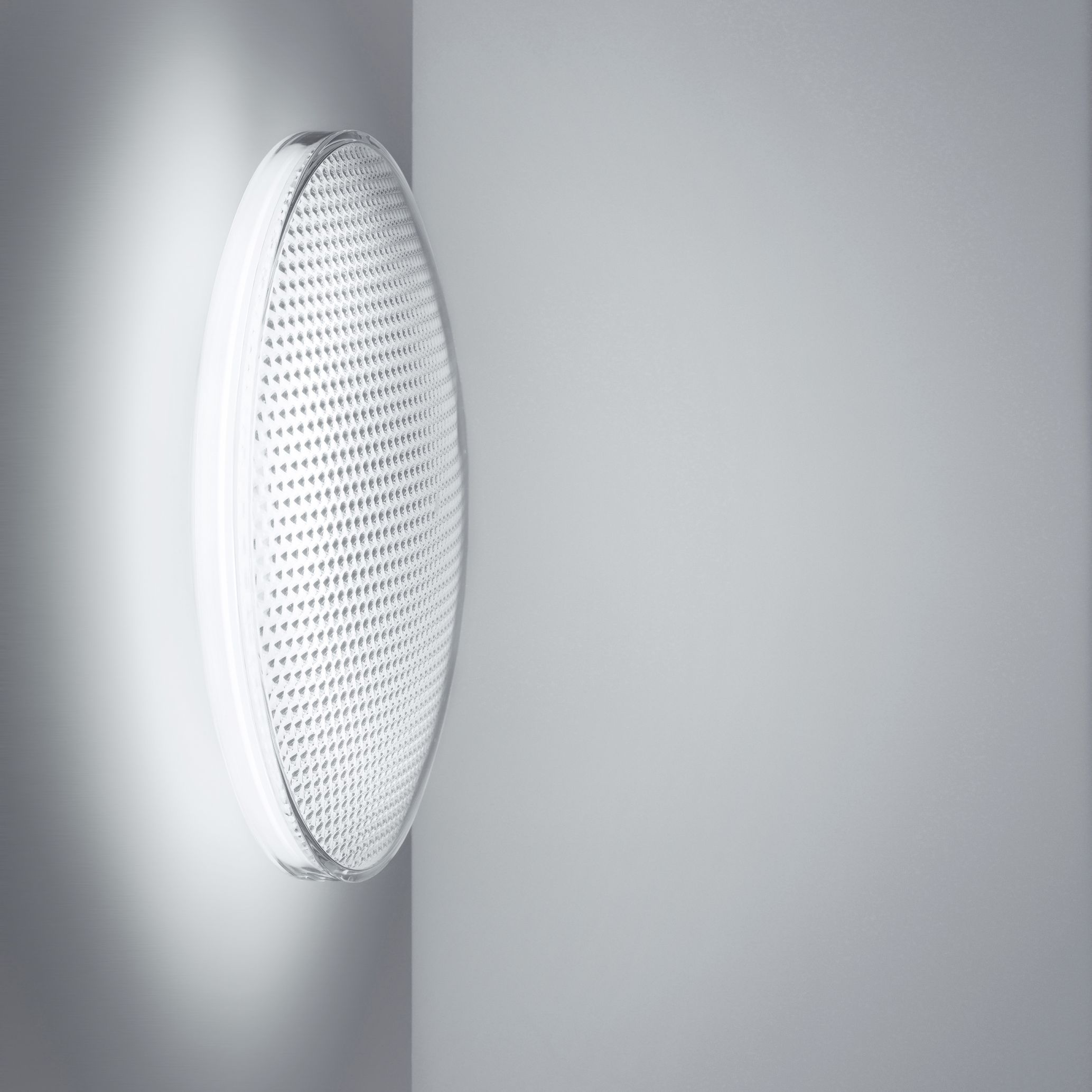 O-lite Wandleuchte: Runde Deckenlampe mit warmweißem Licht, modernes Design für Wohnraum und Büro.