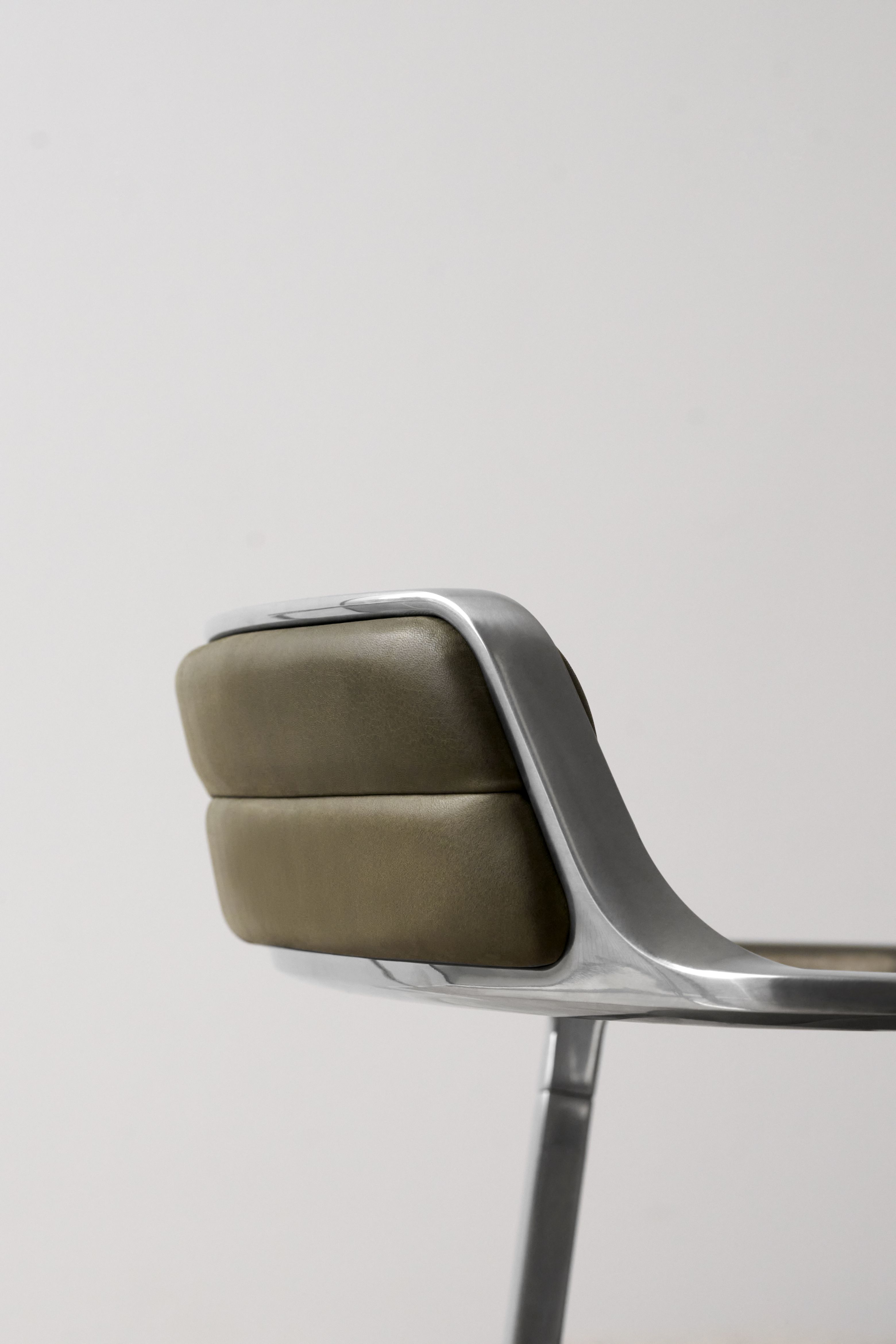 VIPP452 Swivel Stuhl mit Gleitern grünes Leder Vipp