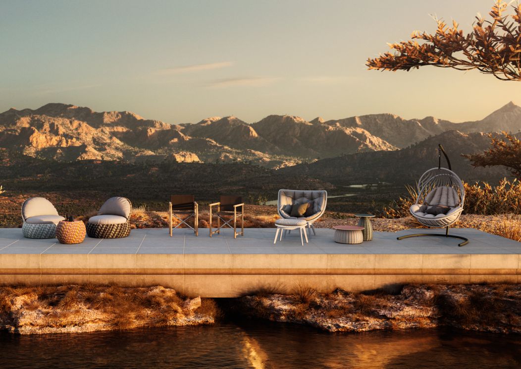 Dedon Porcini Beistelltisch, runder Outdoor-Tisch aus geflochtenem Material, Teil einer luxuriösen Gartenmöbel-Kollektion.