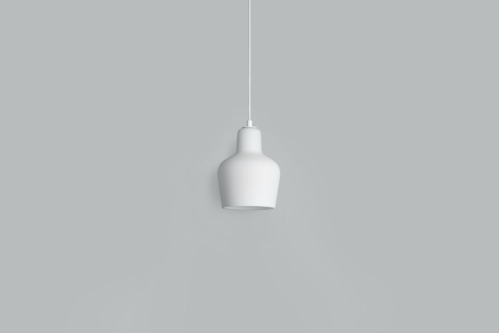 Weiße A440 Hängeleuchte von Artek mit minimalistischem Design und sanftem Lichtschein für moderne Innenräume.