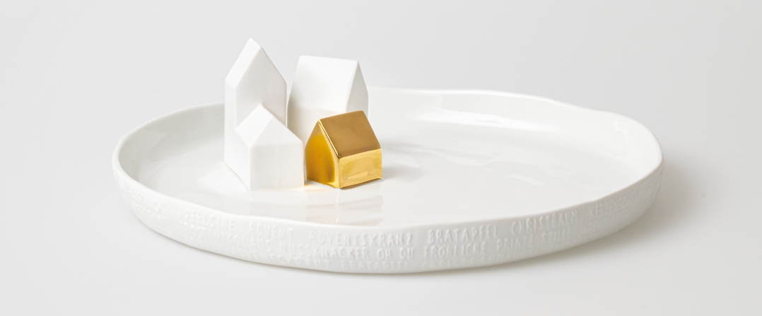 Porzellangeschichten Teller Häuser Räder 