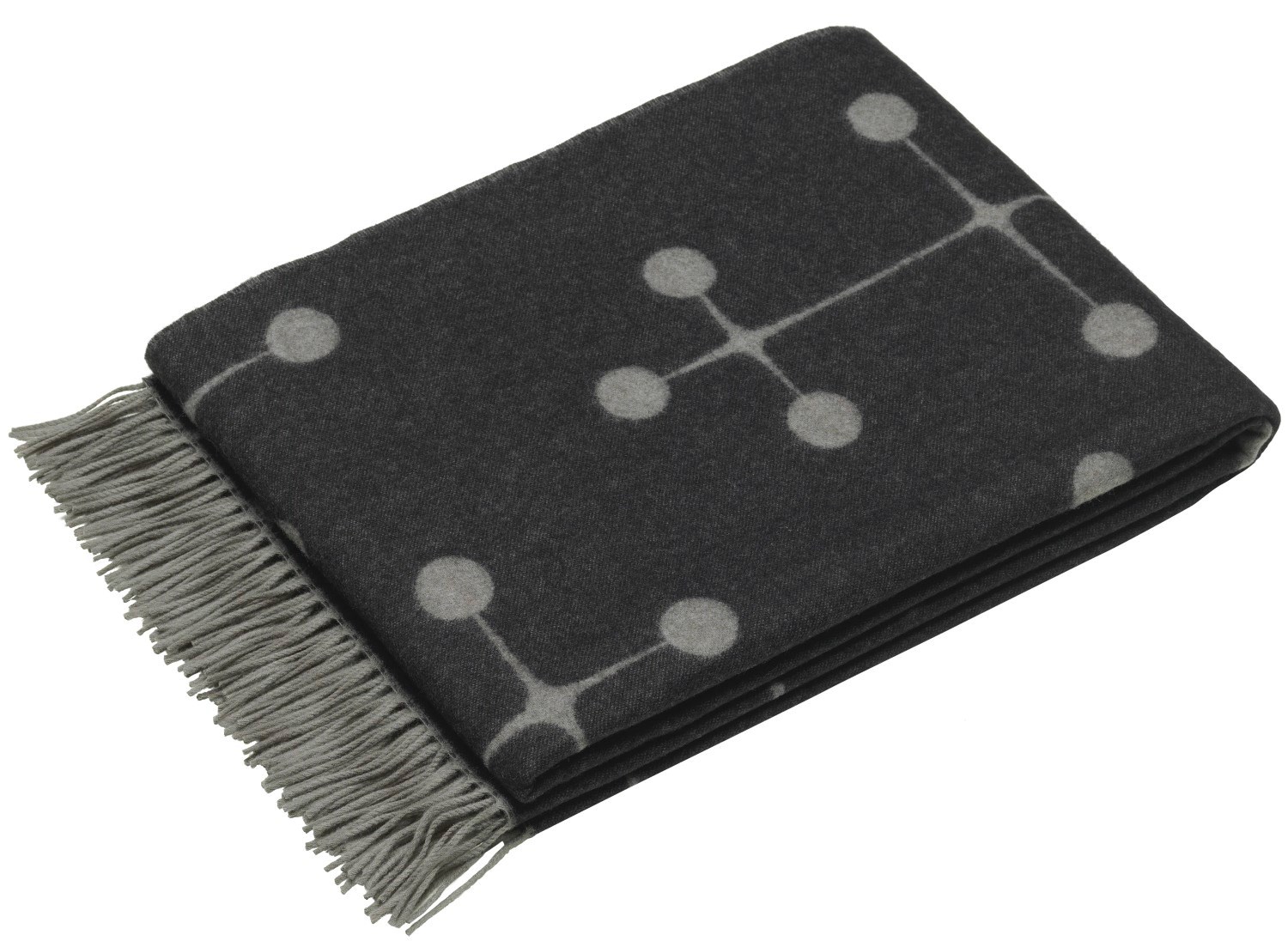 Eames Wolldecke Vitra in Schwarz mit Atom-Muster und Fransen, hochwertige Wohndecke aus Wolle.