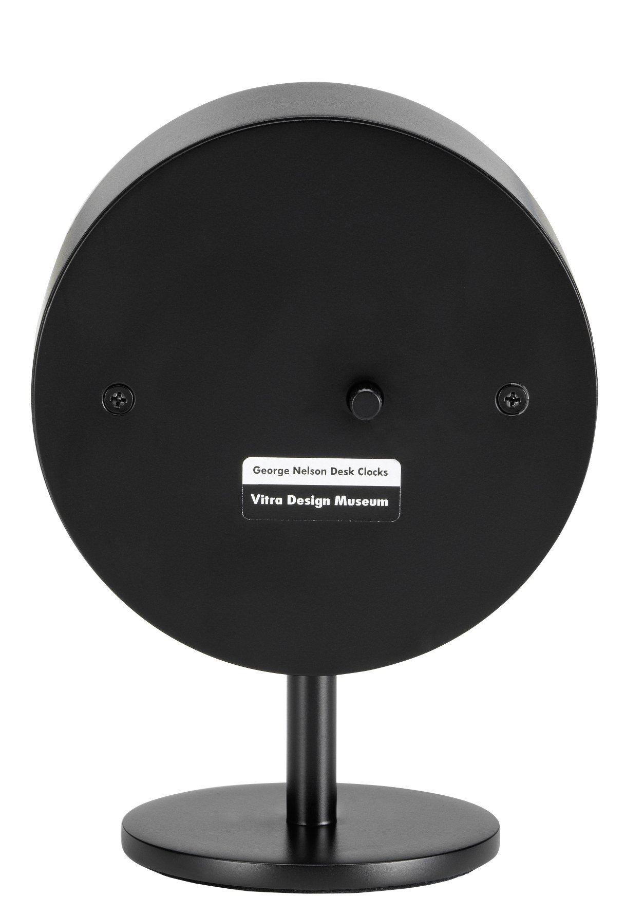 Rückseite der schwarzen Vitra Night Clock Tischuhr mit rundem Ziffernblatt und Standfuß.