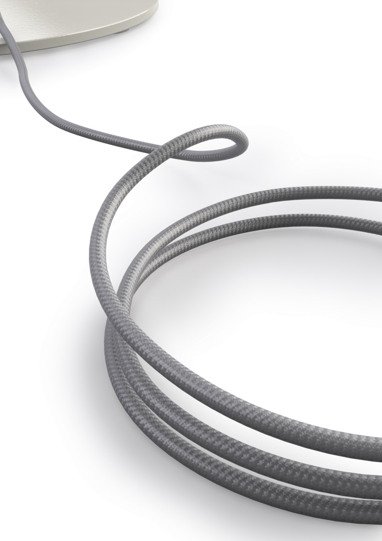 Detailaufnahme des hellgrauen Textilkabels der Oto Stehleuchte von Belux.