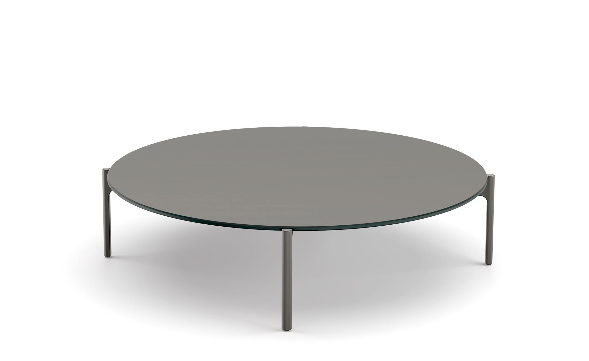 Izon Kaffeetisch von Dedon, runder Wohnzimmertisch mit grauer Tischplatte und filigranem Metallgestell.