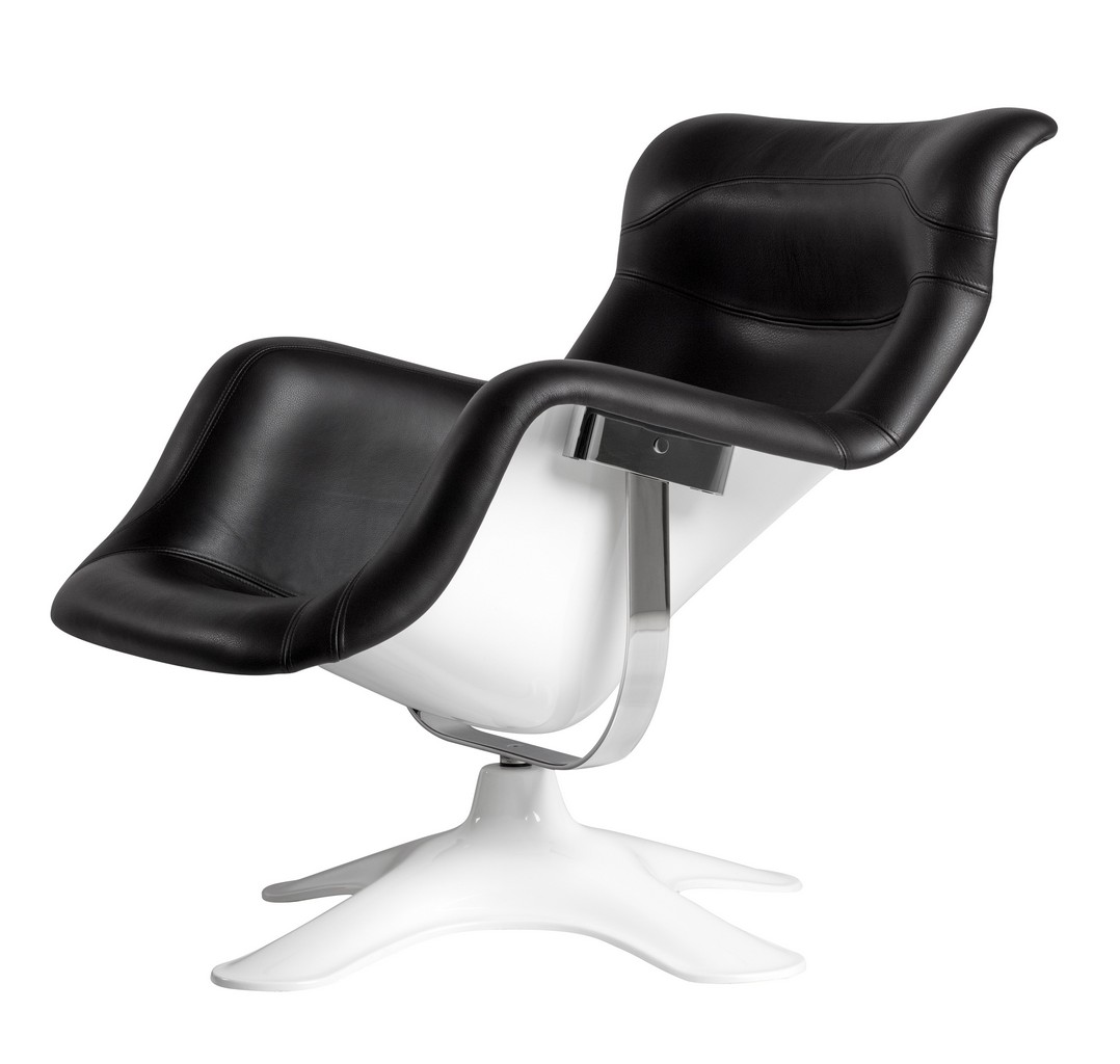 Karuselli Sessel von Artek: Drehsessel mit schwarzem Lederbezug und weißem Fußgestell. Designklassiker.