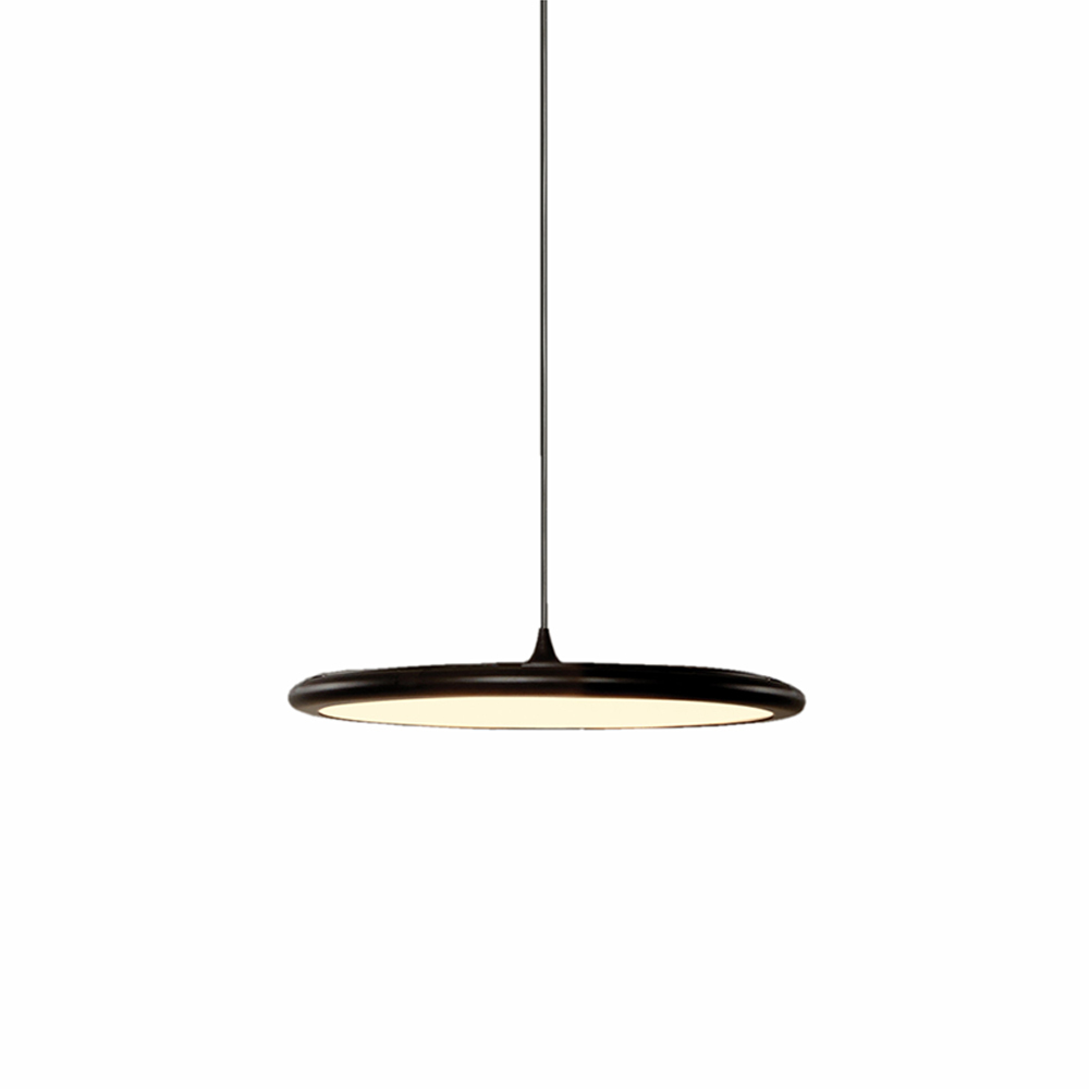 Bilancella Pendelleuchte von Tooy: Runde, schwarze Hängelampe mit warmweißem Licht für moderne Innenräume.