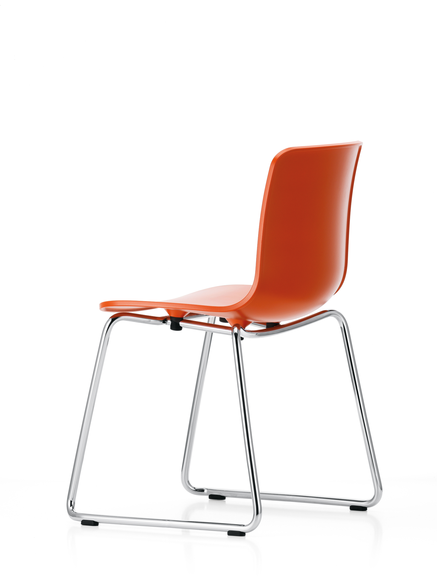 Oranger Hal Sledge Stuhl von Vitra mit verchromtem Kufengestell, Ansicht von hinten. Designstuhl für Esszimmer.