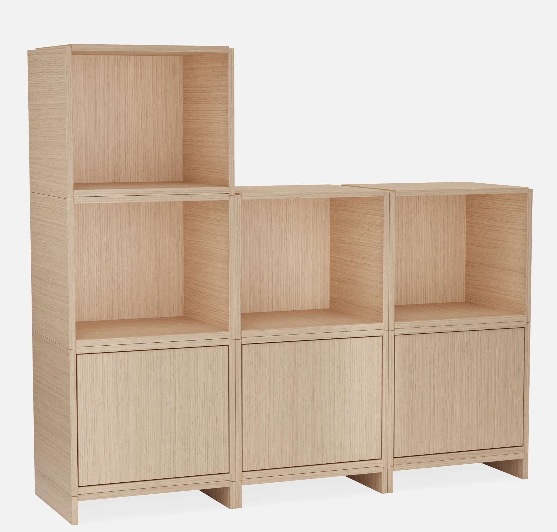 Bricks System Regal von Woud: Modulares Holzregal mit Fächern und Türen in heller Eiche.