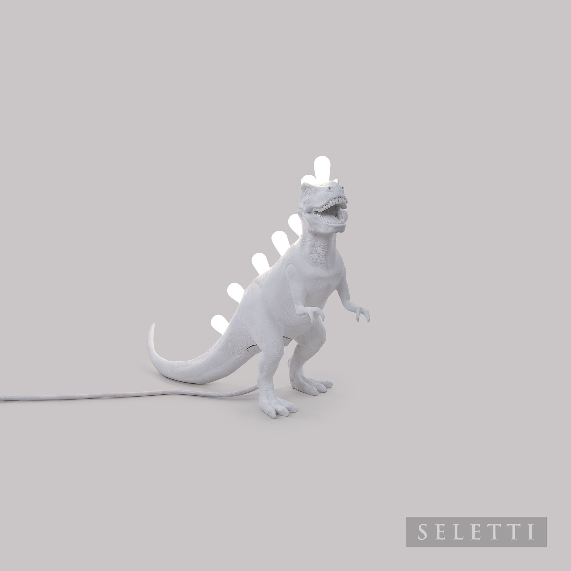 Weiße Jurassic Lamp Rex Leuchte von Seletti: T-Rex Lampe mit Glühbirnen auf dem Rücken.