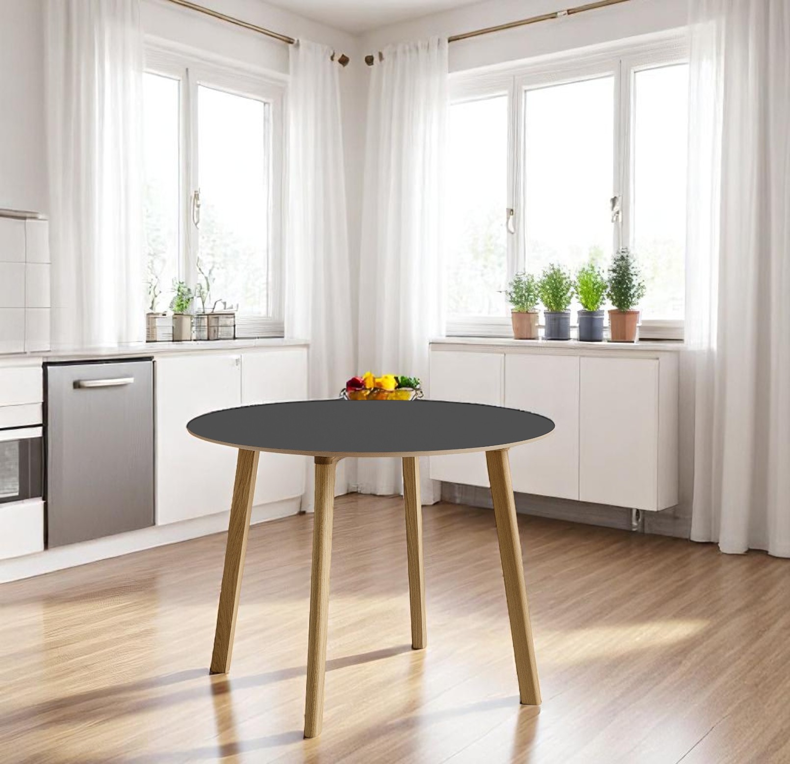 Hay CPH DEUX 220 Tisch mit runder, anthrazitfarbener Tischplatte und hellen Holzbeinen in moderner Küche.