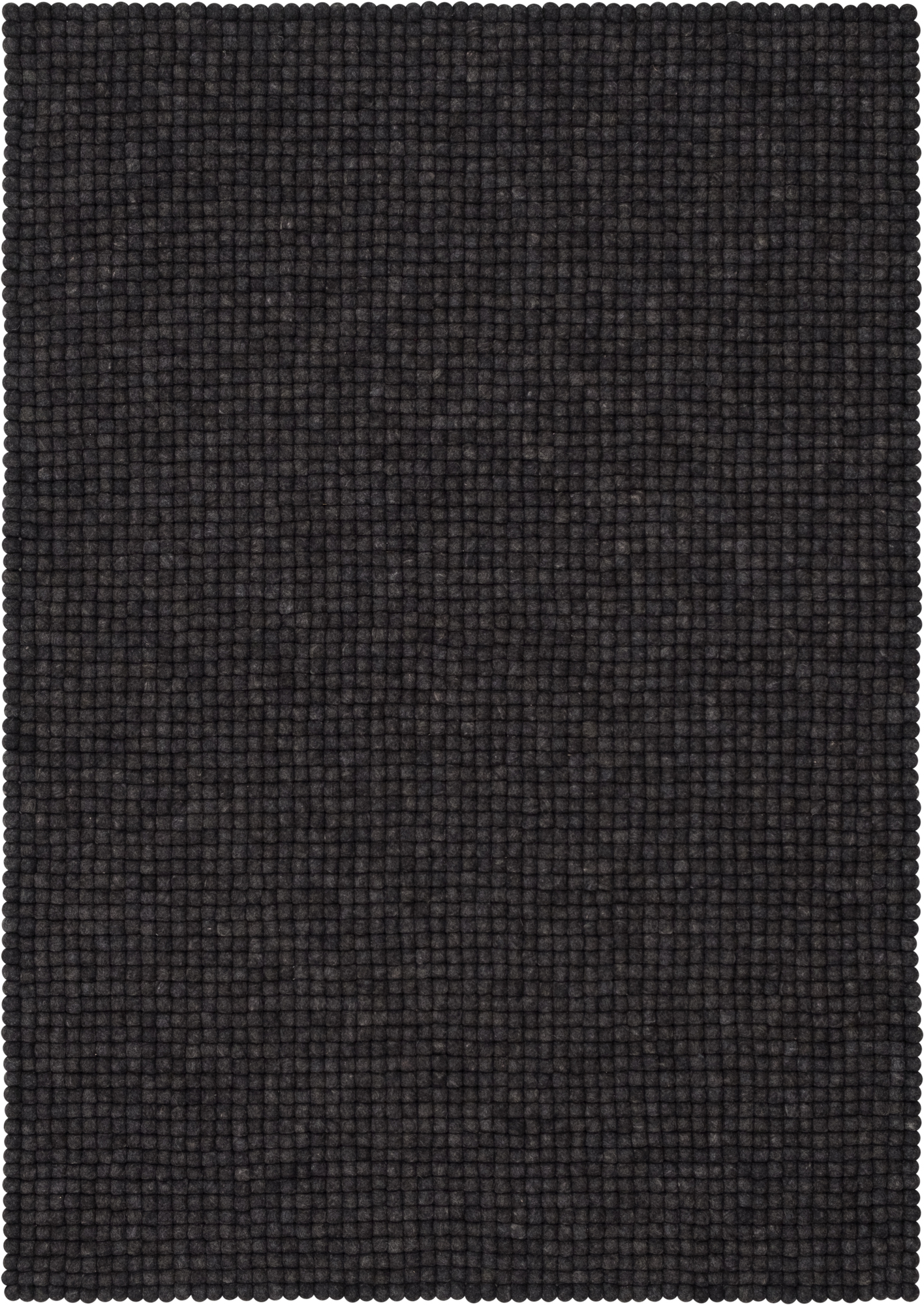 Detailaufnahme: Dunkelgrauer Filzkugel Teppich Myfelt, Größe 160x230 cm, aus reiner Schurwolle.