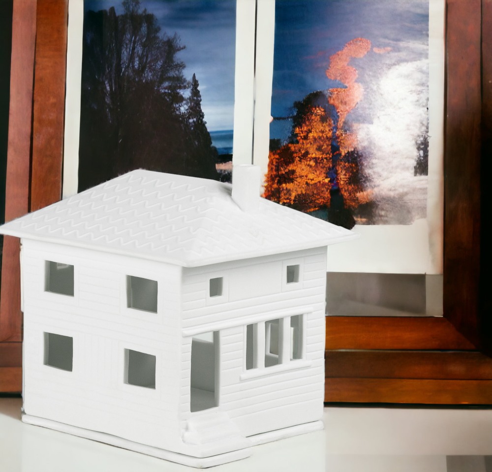 Weißes Lichthaus im Stadtvilla-Stil von Räder, dekoratives Wohnaccessoire für stimmungsvolle Beleuchtung.