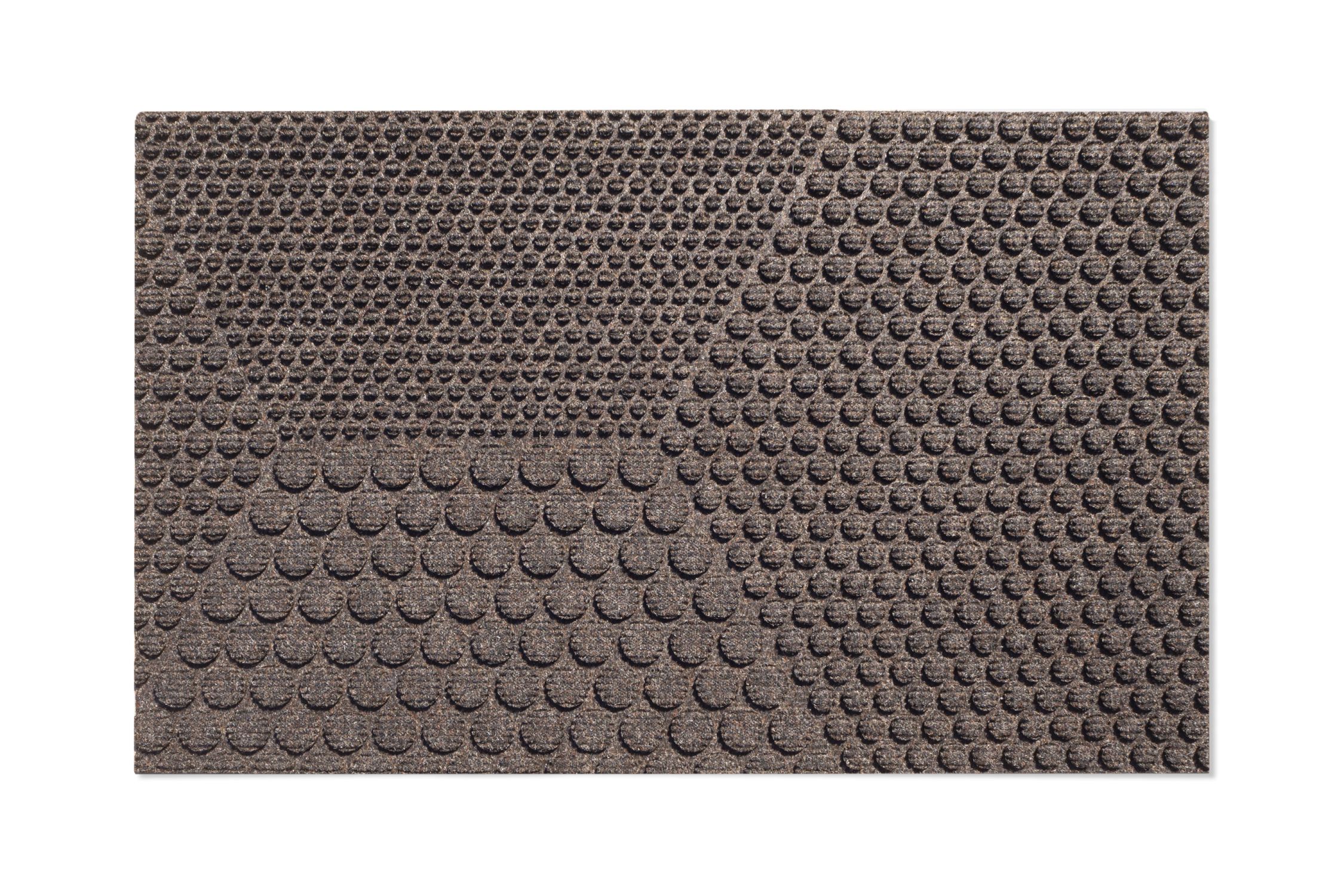 Braune Hex Fußmatte Soil von Heymat (55x90 cm) mit erhabenem, kreisförmigem Muster für den Innenbereich.