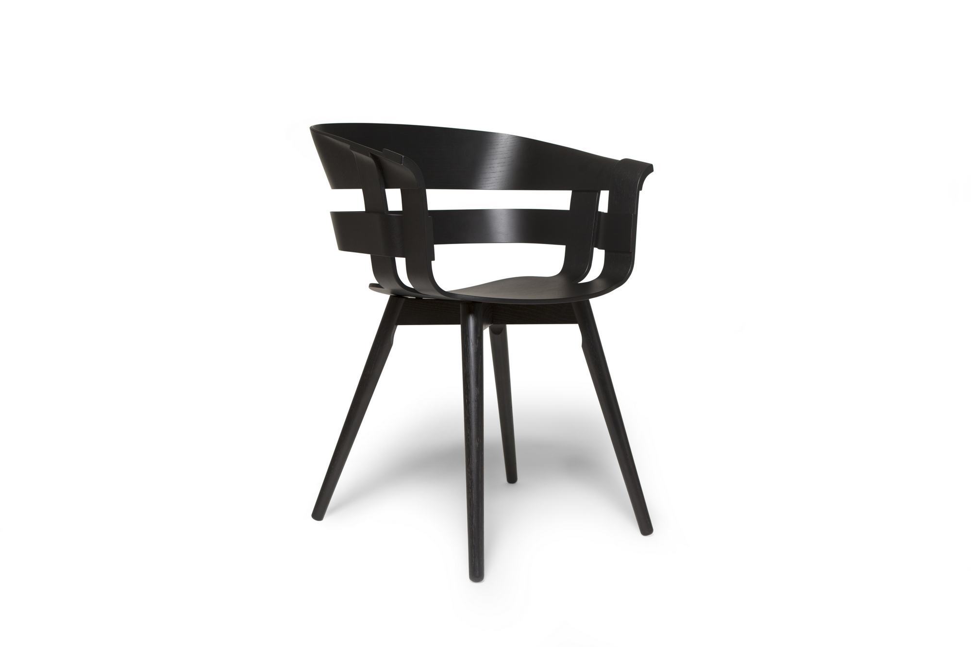 Schwarzer Wick Chair Stuhl von Design House Stockholm mit Armlehne und drei Beinen.