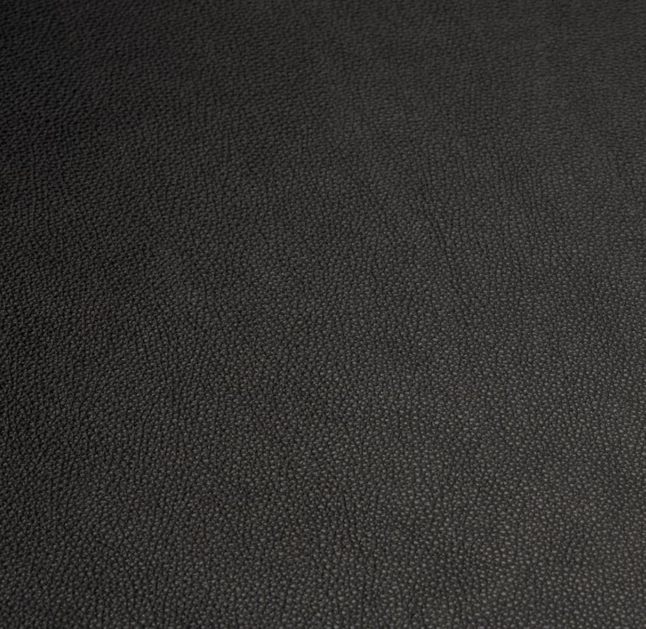 Detailaufnahme der graphitschwarzen Lederauflage für USM Beistelltisch, hochwertiges Leder "Leather on Top".