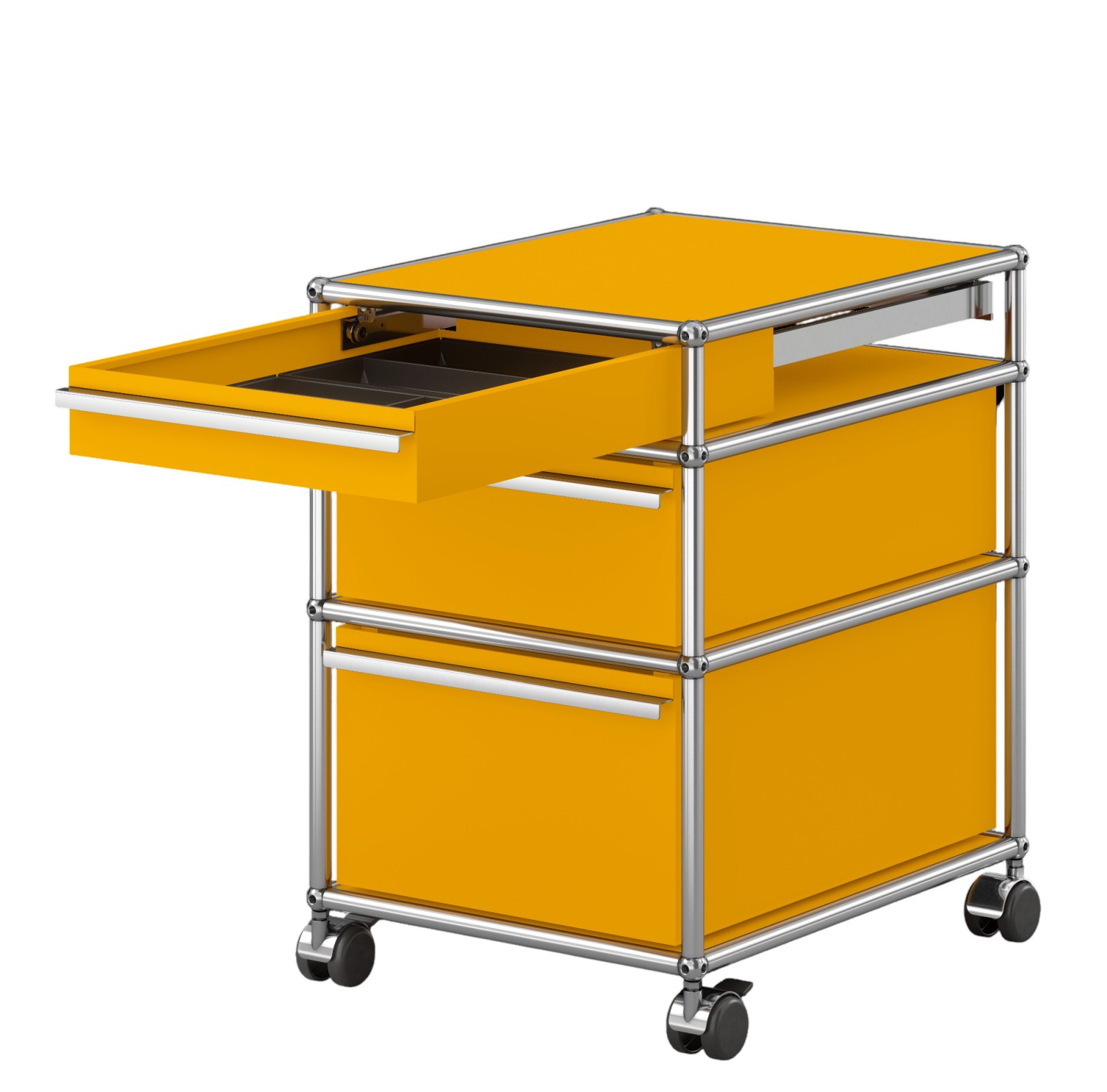 USM Haller Rollcontainer in Goldgelb mit drei Schubladen, eine Schublade ist geöffnet.