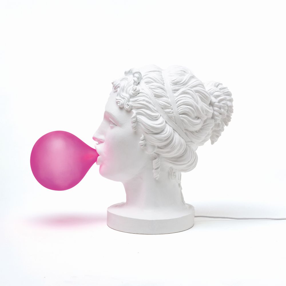 Grace Lamp von Seletti: Tischleuchte in Form einer Büste mit pinker Kaugummi-Beleuchtung.
