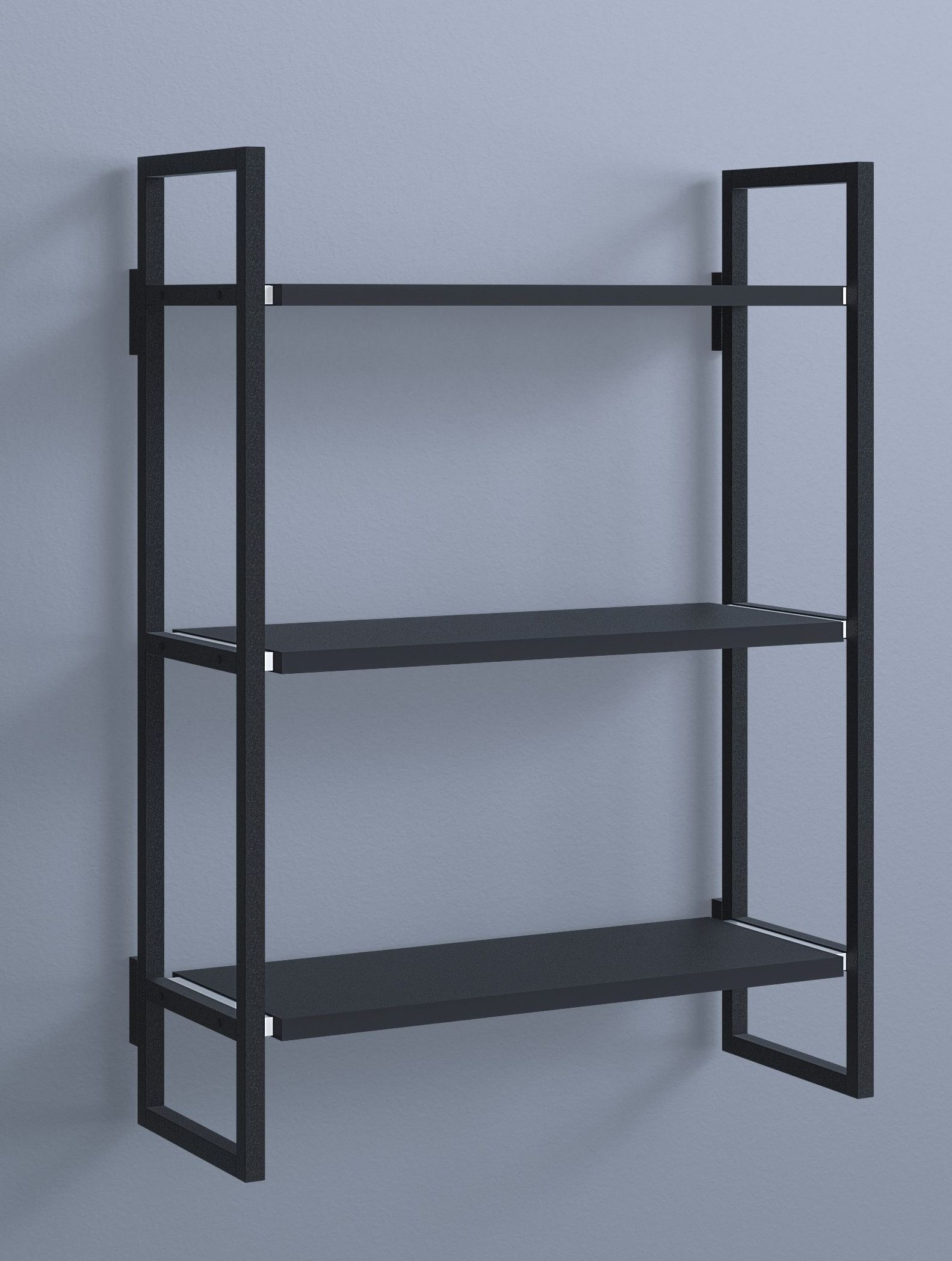 Schwarzes Oncono Wandregal Grundmodul B mit drei Ablageflächen vor grauer Wand.