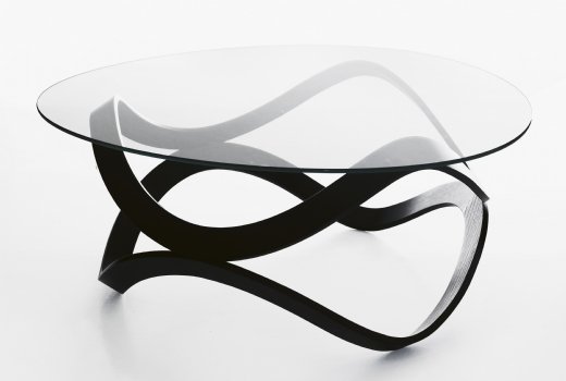 Newton Sofatisch mit Glasplatte und geschwungenem, schwarzem Holzfuß von Karl Andersson & Soener.