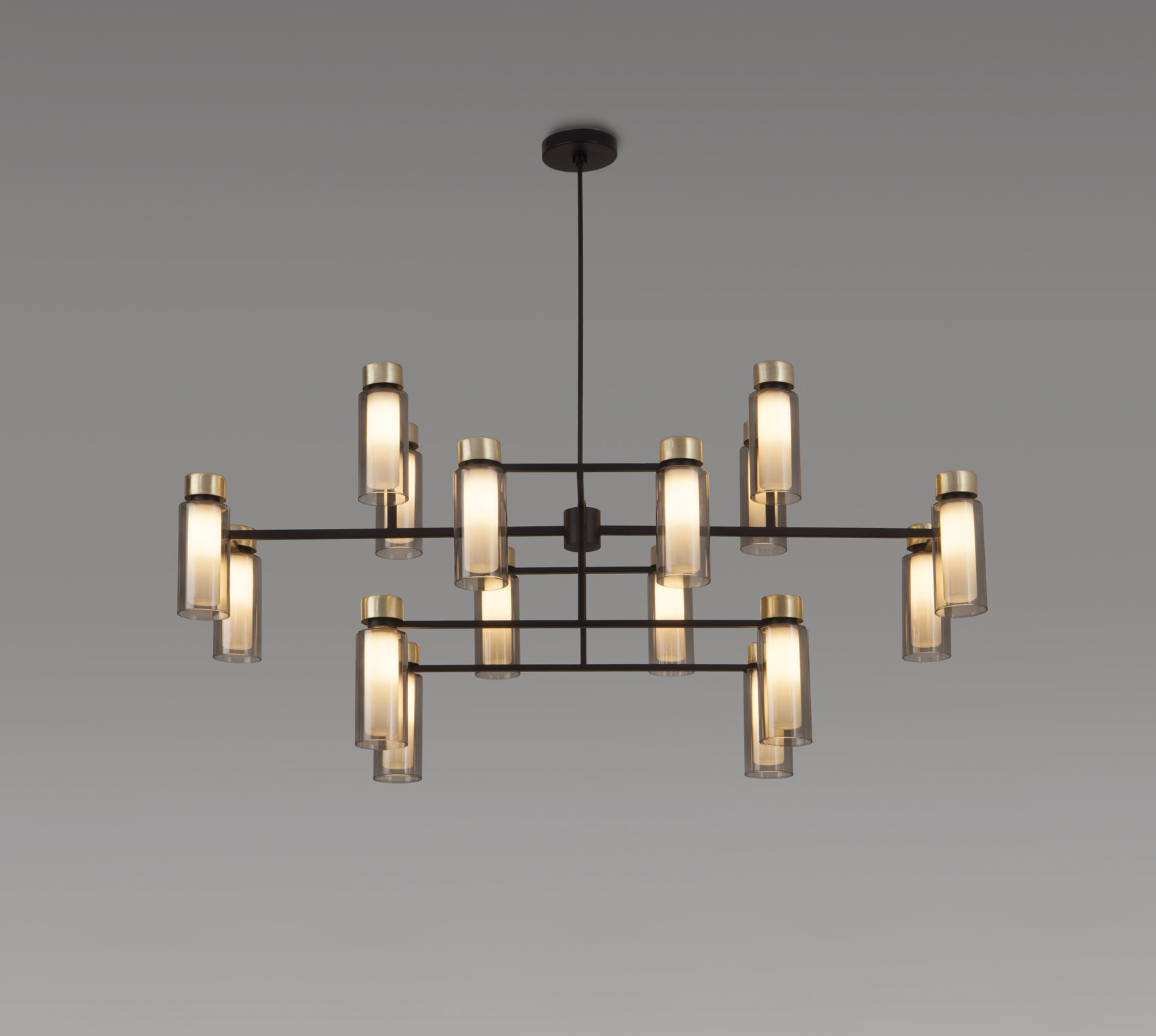 Osman Kronleuchter von Tooy: Moderne Hängelampe mit zylindrischen Glaselementen und schwarzem Metallrahmen.