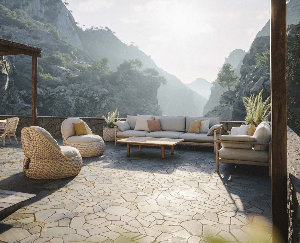 Outdoor-Lounge-Set mit Sofa, Sesseln und Tisch auf einer Terrasse mit Bergblick. Gartenmöbel aus Rattan und Holz.