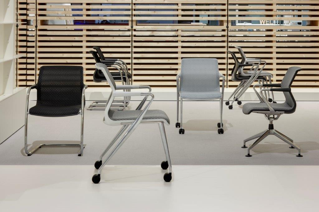Vitra Unix Chair: Mehrere Bürostühle in Schwarz, Grau und Weiß mit und ohne Rollen.