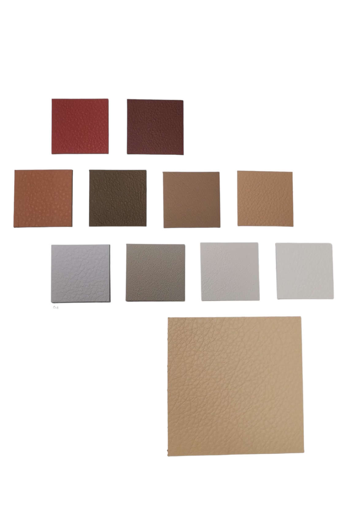 Ledermusterkarte mit verschiedenen Premium Leder Farbmustern in Rot, Braun, Grau und Beige für Möbel.