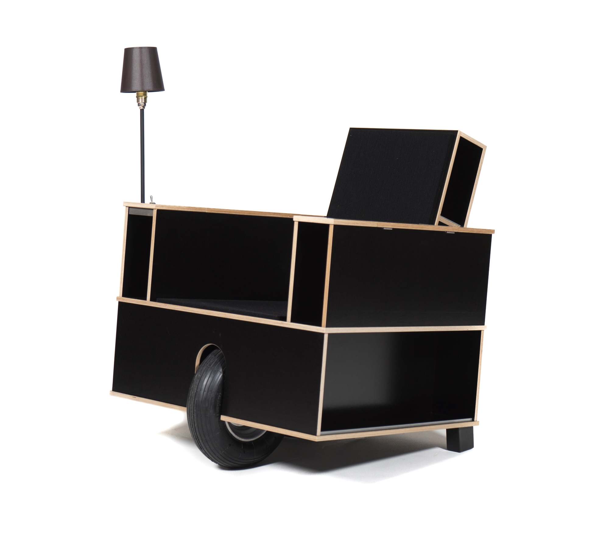 Bookinist Lesesessel von Nils Holger Moormann: Schwarzer, mobiler Sessel mit Lampe und Stauraum.