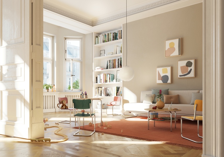 Helles Kinderzimmer mit Thonet S 43 K Freischwinger Kinderstuhl in Grün und Spielzeug auf dem Boden.