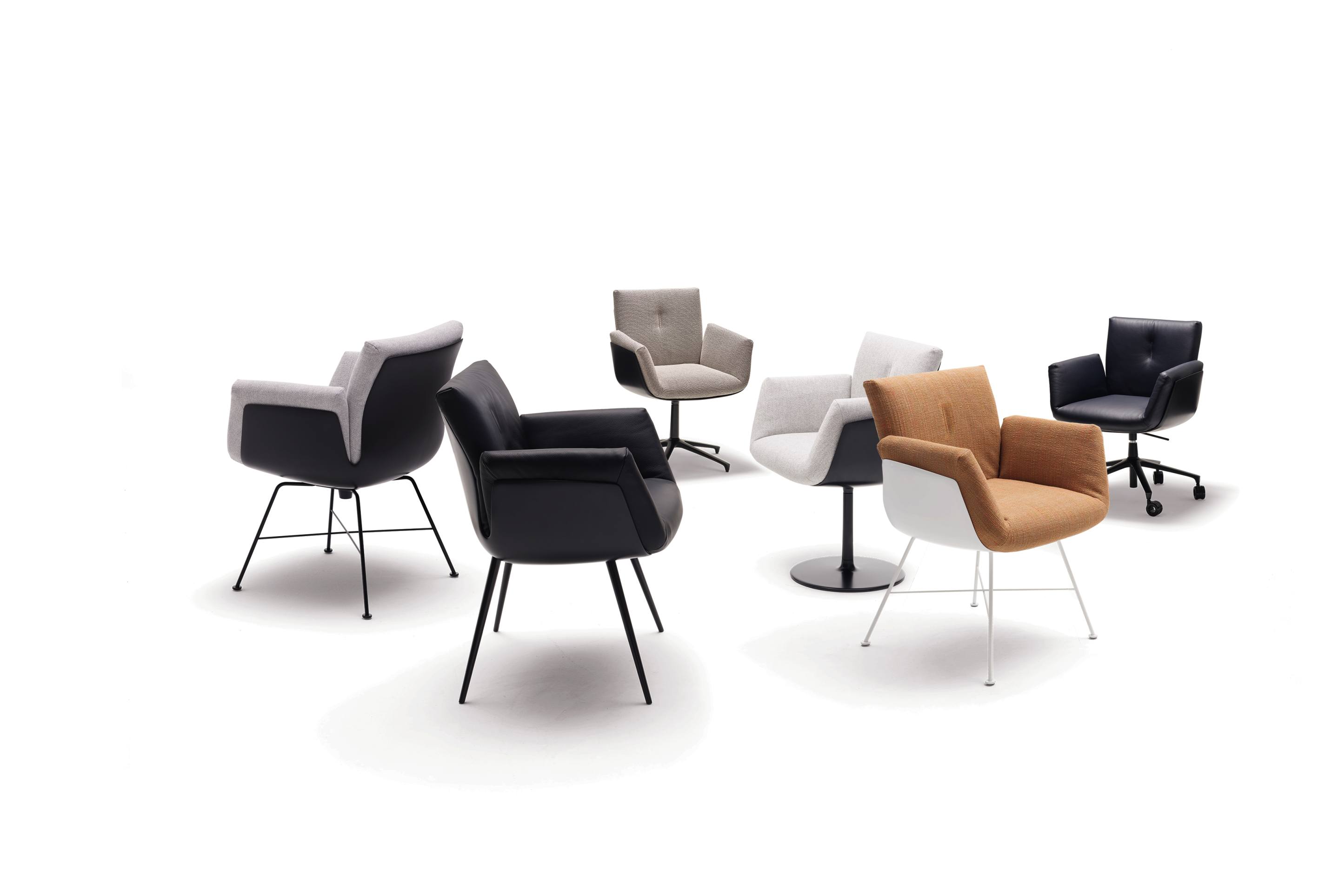 Alvo Armlehnen Drehstühle von Cor mit verschiedenen Bezügen und Gestellen auf weißem Hintergrund.