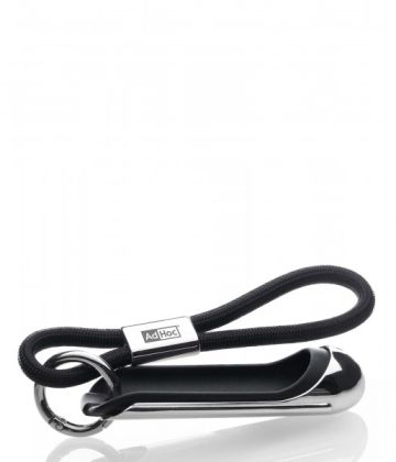 Fingerschutz SafetyTouch® von AdHoc: Schwarzer Küchenhelfer mit Schlaufe und Ring zum sicheren Schneiden in der Küche.