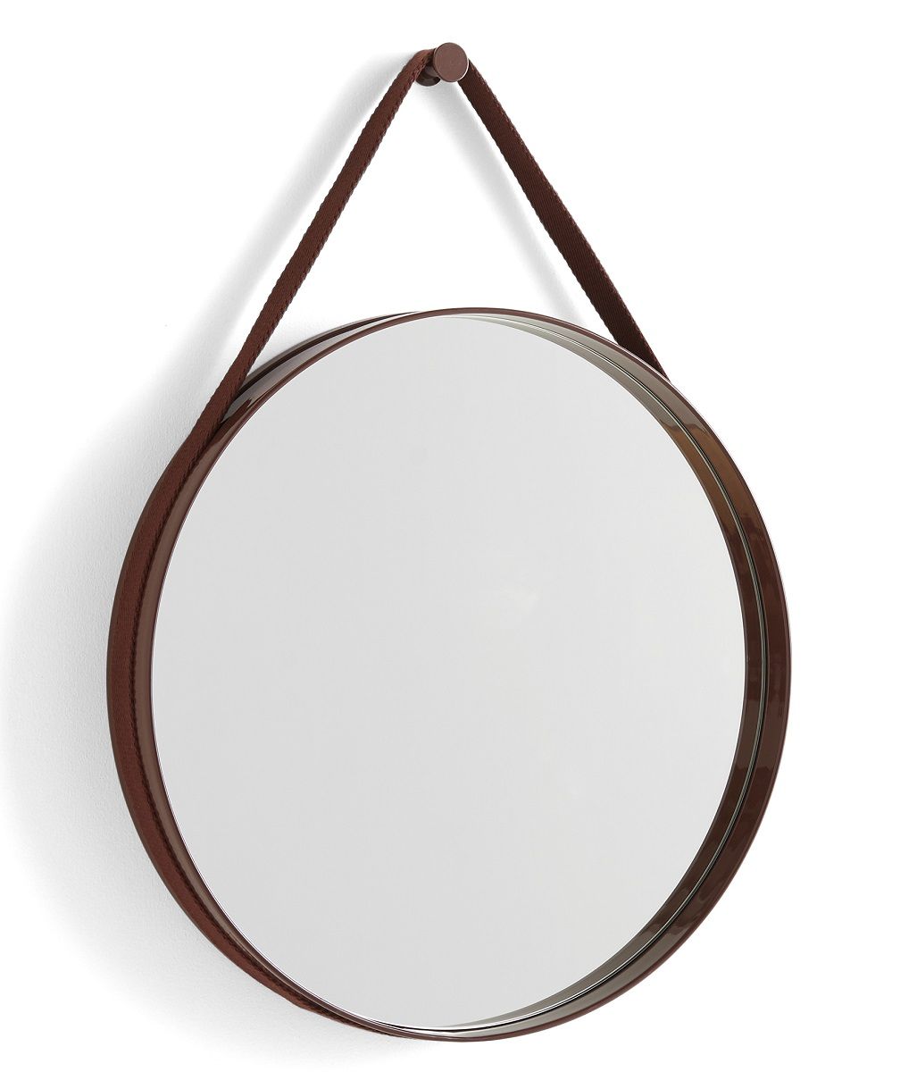 Dunkelbrauner runder Wandspiegel mit Lederriemenaufhängung. Hay Strap Mirror für moderne Wohnraumgestaltung.