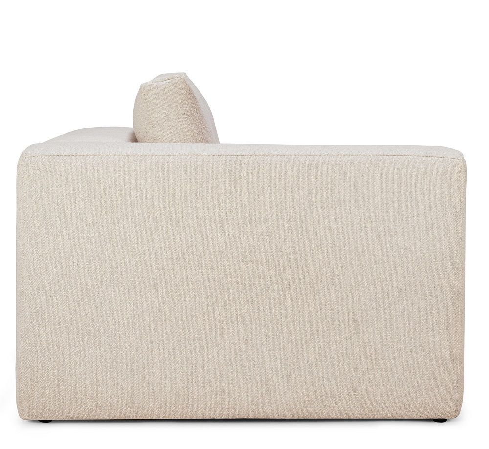 Seitenansicht des Mellow Sofas von Ethnicraft in Off White mit rechter Armlehne.