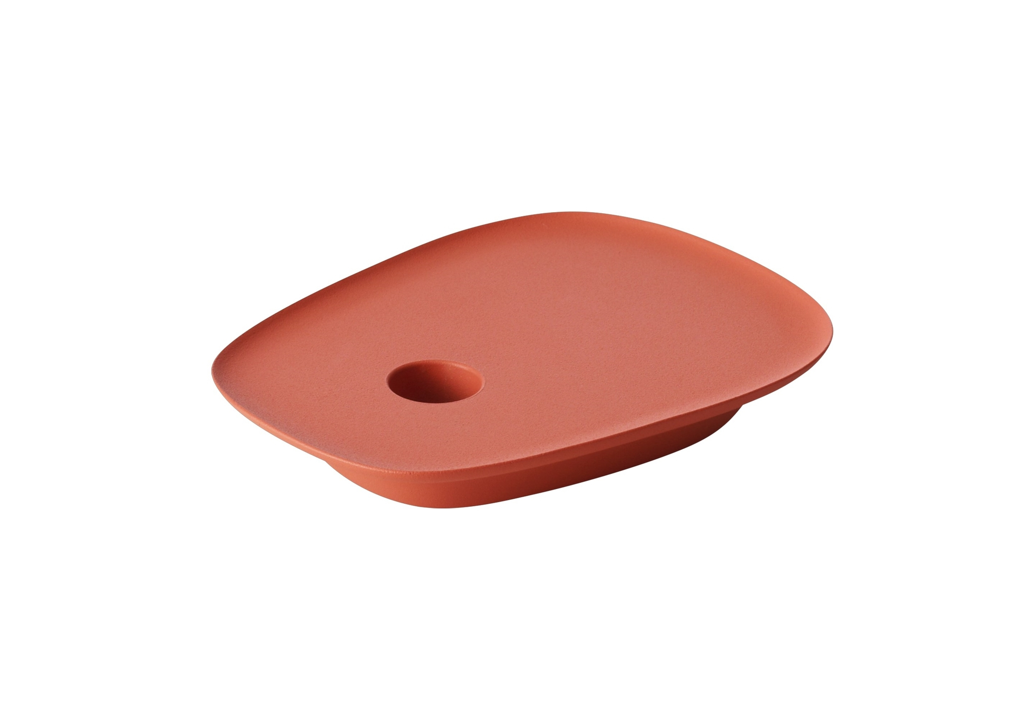 Nahaufnahme des Muuto Float Kerzenhalters in Terrakotta, moderner Kerzenständer für Stabkerzen.