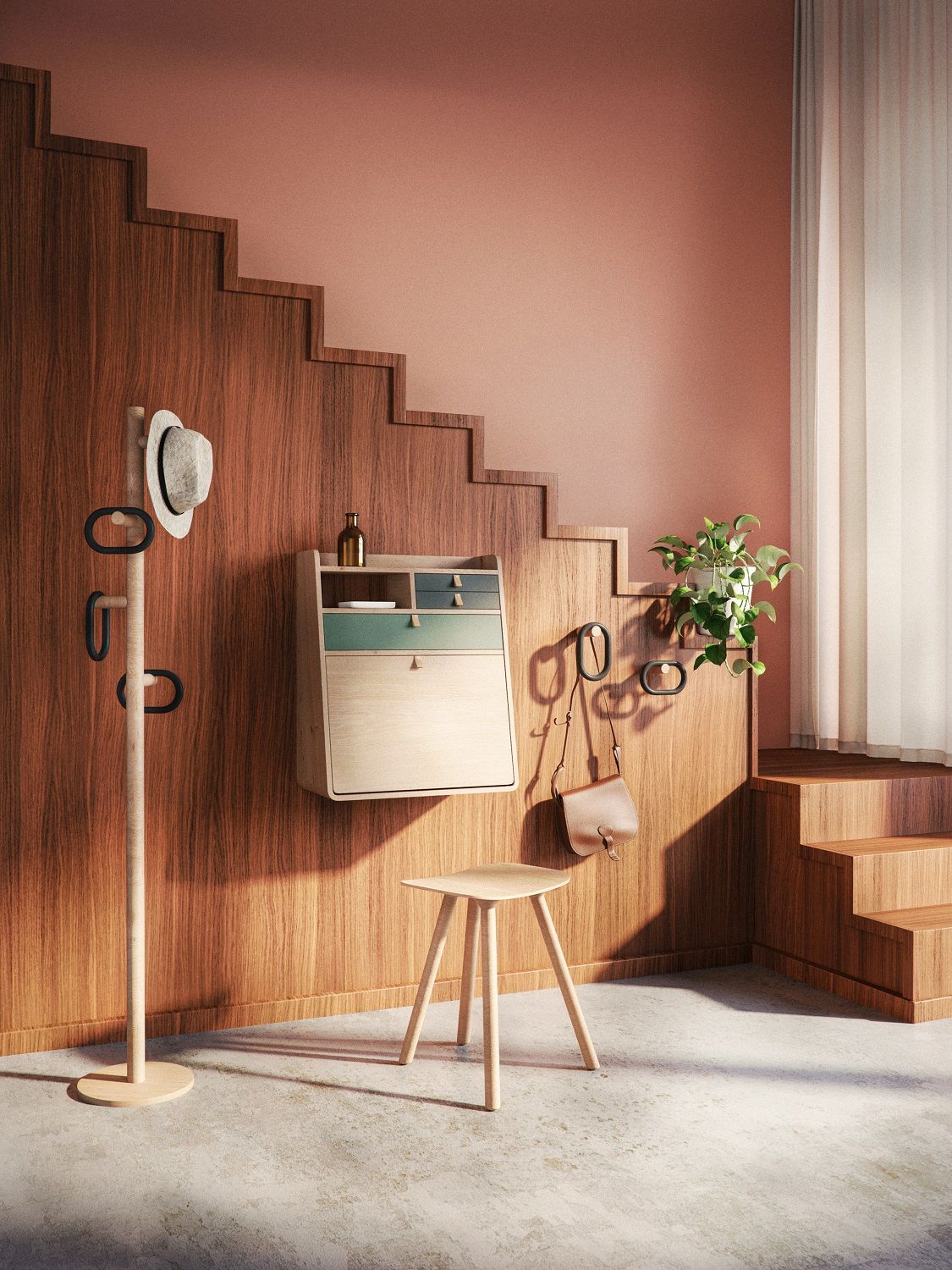 Gaston Wandsekretär von Hartô, helles Holz mit farbigen Schubladen, Hocker und Garderobe im Raum.