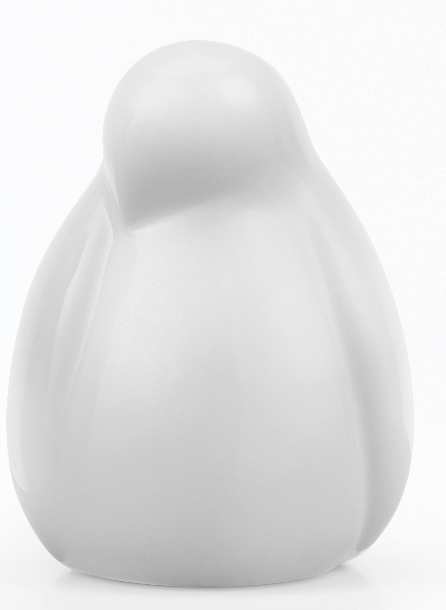 Nahaufnahme der kleinen, weißen Resting Bird Figur von Vitra. Dekorative Keramik Vogel Skulptur.