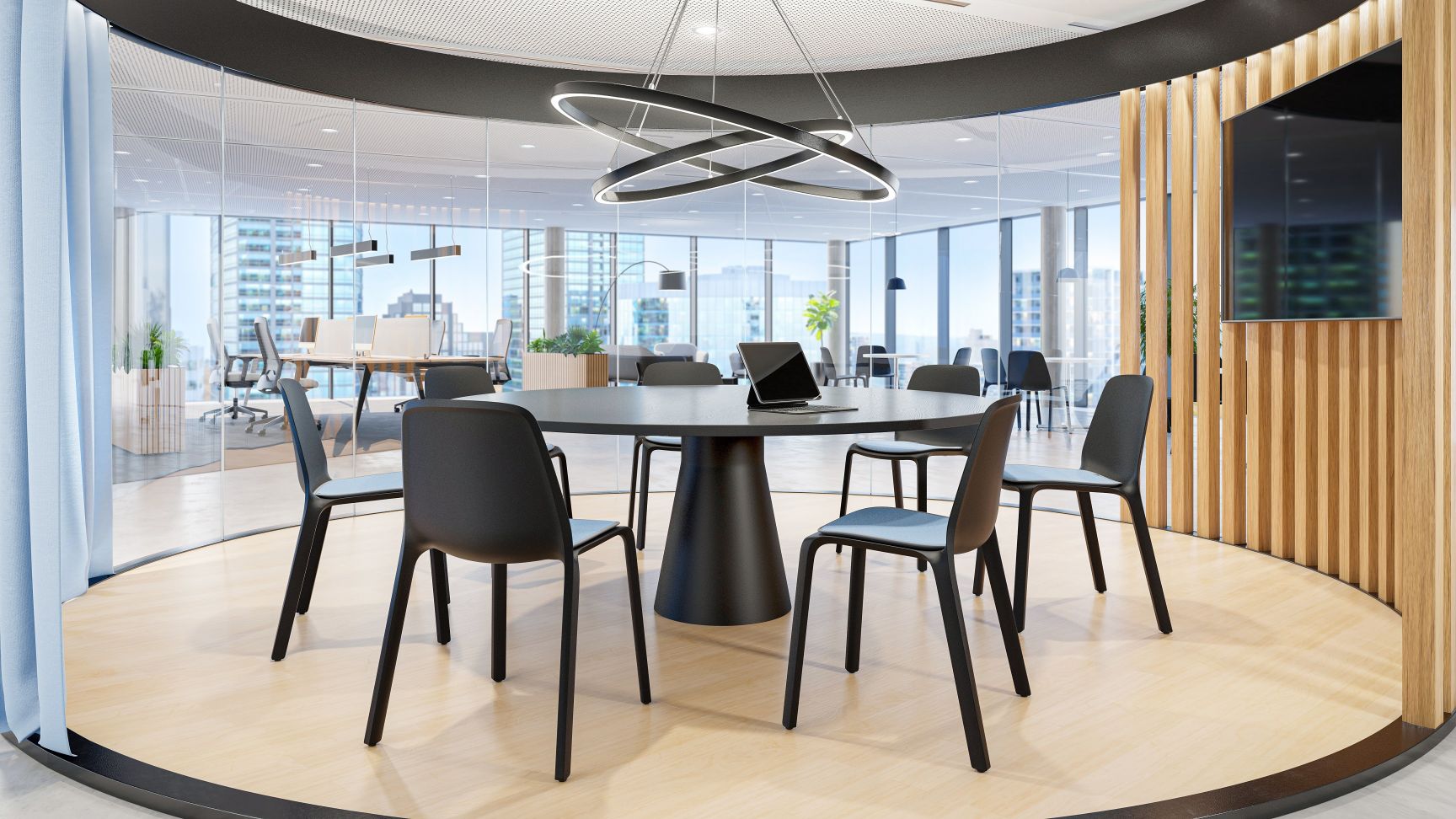 Moderner Konferenzraum mit schwarzem Rundtisch und Monois1 Besucherstühlen von Interstuhl. Büromöbel für Besprechungen.