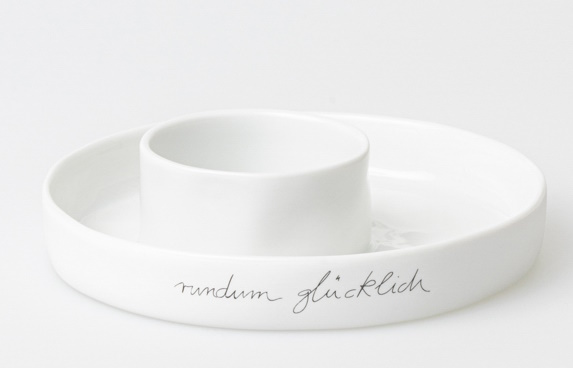 Weiße Räder Schale "Rundum Glücklich" aus Porzellan, ideal als Dipschale oder für Snacks.